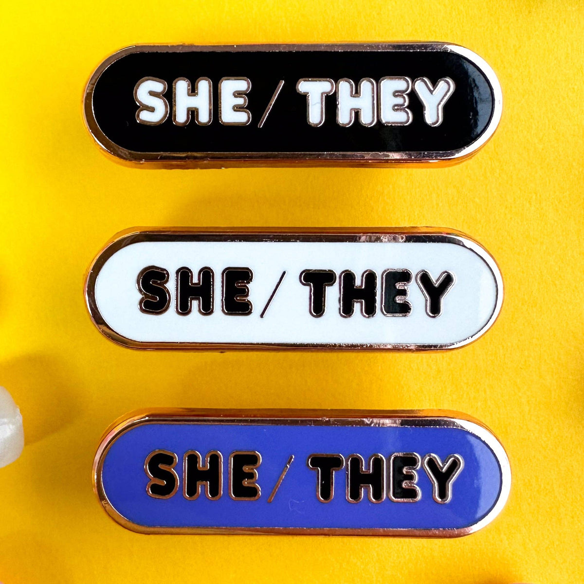 She/They Pronoun Plaque Enamel Pin - Undercover Otter - Pins - Kitty With A Cupcake - Black