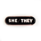 She/They Pronoun Plaque Enamel Pin - Undercover Otter - Pins - Kitty With A Cupcake - Black